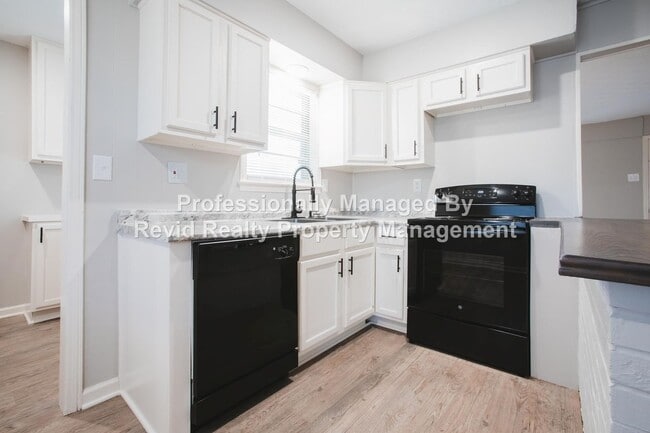 Building Photo - First Month Free on a 18-Month Lease!!!!