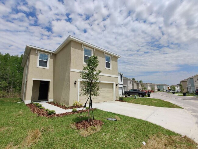 Foto del edificio - 7527 Cypress Walk Dr