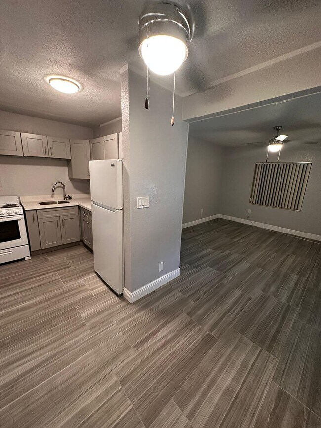 Kitchen, Dinning & Living Room View - 7991 NW 25th Ave