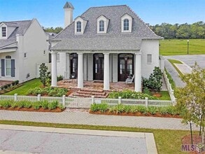 Building Photo - 3151 Pointe-Marie Dr