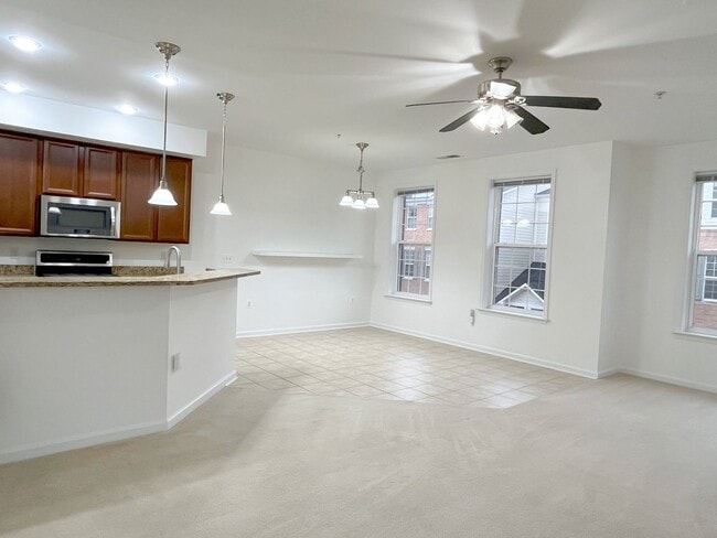 Building Photo - Sizable End Unit Townhome in Wheaton w/ 2 Car Garage!