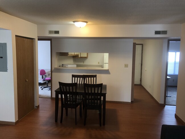 Building Photo - 4 Bedroom 2 bath Condo Available for Move ...