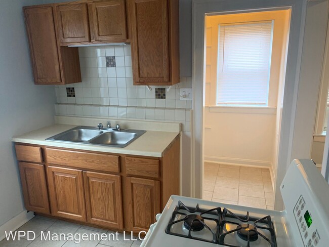Building Photo - 7945 S Langley Ave