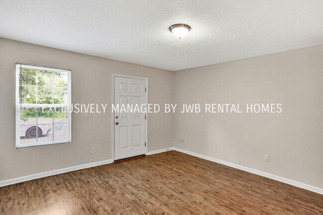 Building Photo - 8451 McGirts Village Ln