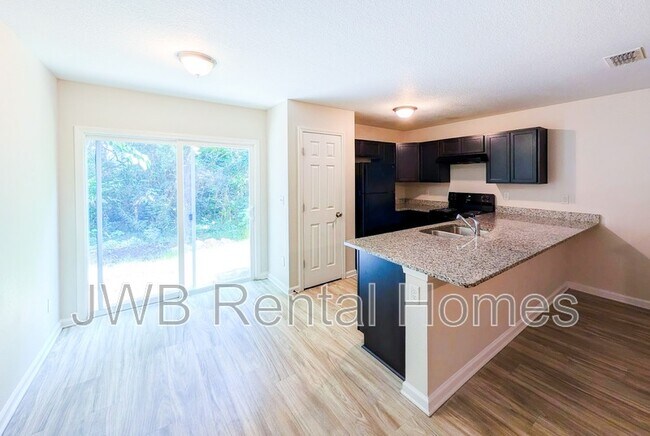 Foto del edificio - 6869 Lake Mist Ln