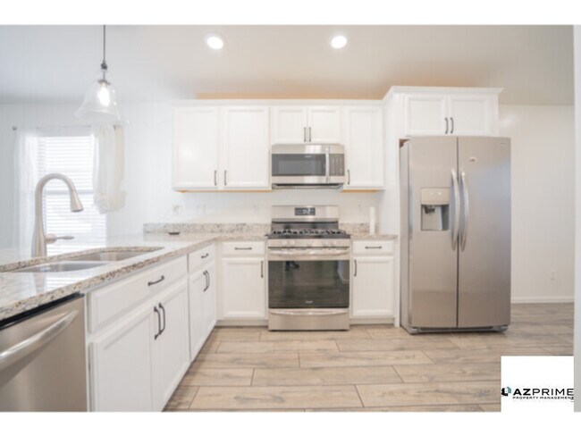 Building Photo - Step Into Unrivaled Comfort And Style With This Like-New 3/2 Phoenix Gem.