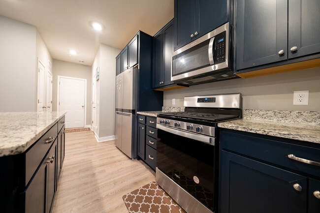 Building Photo - 6464 Genevieve Trail