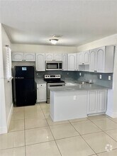 Building Photo - 5857 NW 13th Ave