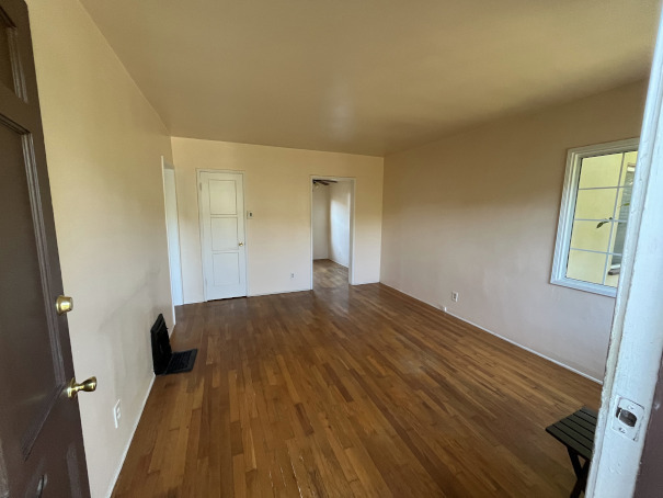 Sitting room, view at entry door - 2444 Oak St