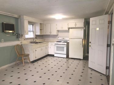 Kitchen has upgraded refrigerator/ lots of cabinets - 87 Salem St