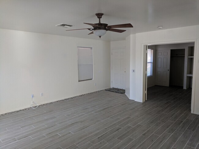 Living room and den/4th bdrm - 43750 W Bedford Dr