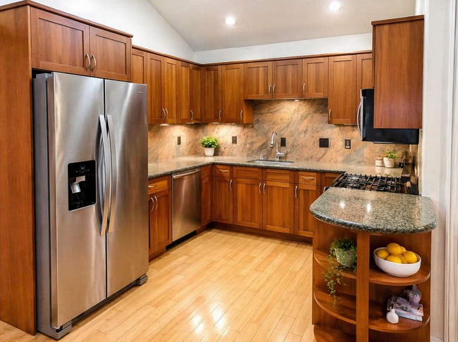 Granite-top kitchen with eat-in island. All Stainless Steel Bosch appliances. - 3035 Chapman St