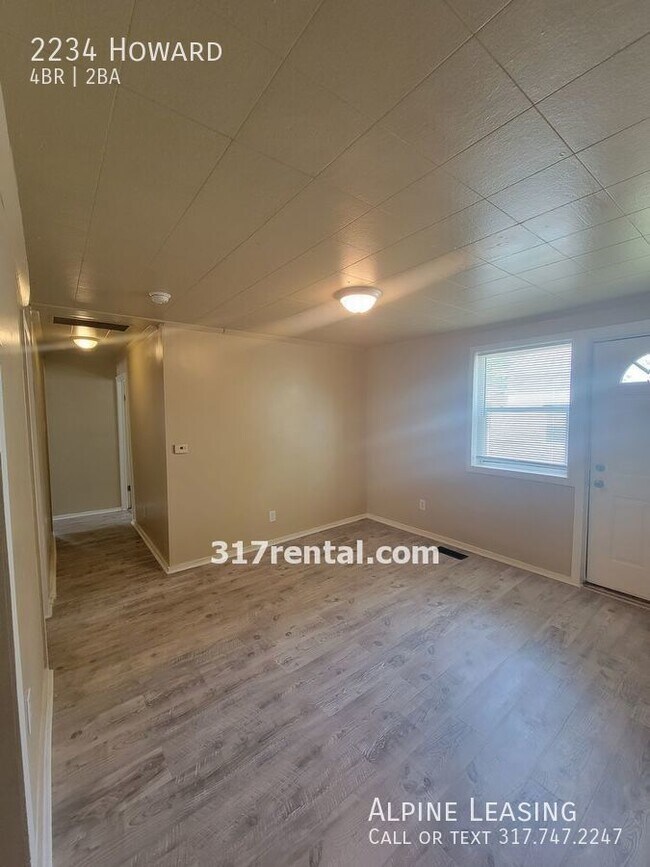 Building Photo - 4/2 with garage/workshop combo (has workin...
