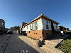 Building Photo - 7833 Normandie Ave