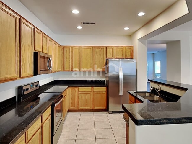 Building Photo - 10363 E Juanita Ave