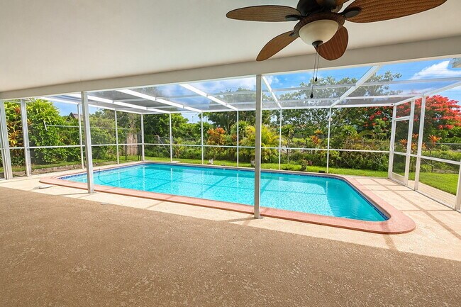 Photo - "Spacious & Renovated 4-Bed Oasis with Pool in Boca Raton - 2136 Sq Ft of Elegance!" Apartment