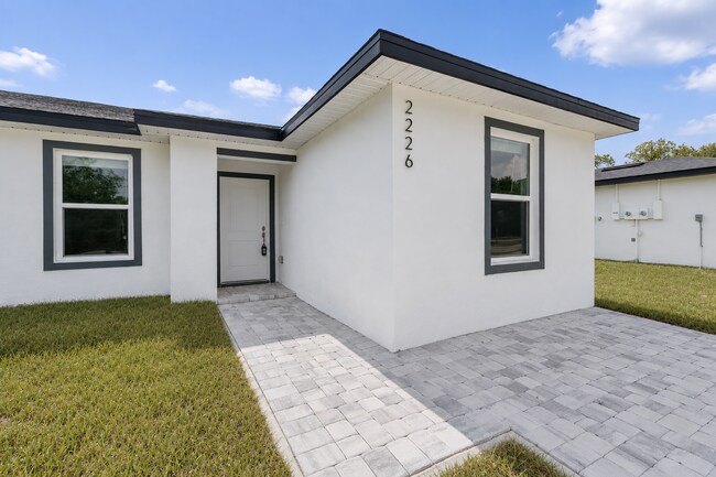 Building Photo - "Charming 3-Bed, 2-Bath Duplex Gem in Port Charlotte - Your Ideal Home Awaits!"