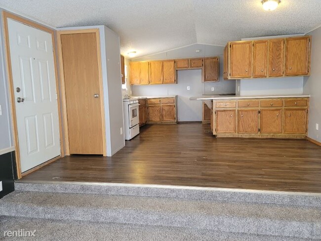 Building Photo - 2 br, 1 bath Mobile Home - 129 W 10th St