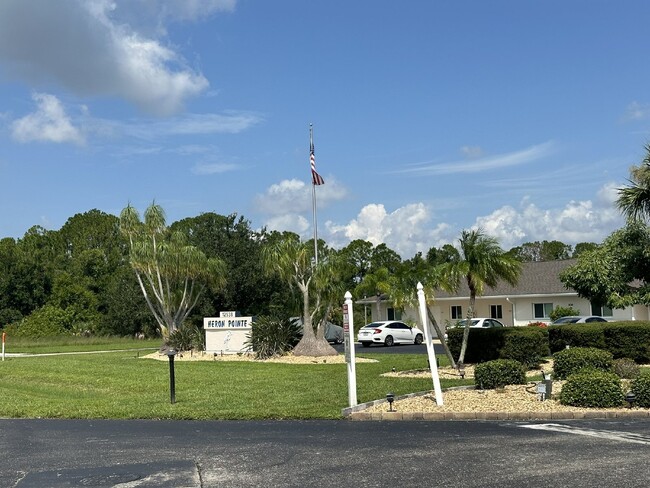 Building Photo - Winter Getaway at Heron Pointe Condominiums