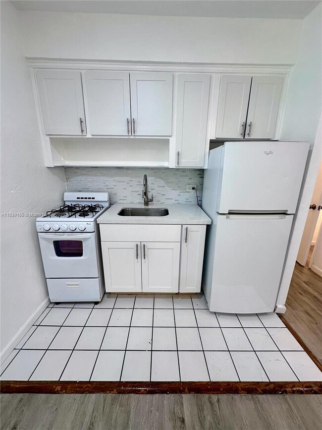 Building Photo - 9064 Collins Ave
