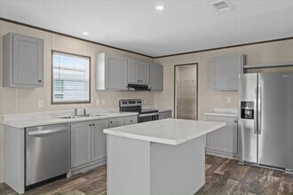 Building Photo - 6711 Hidden Oaks Dr