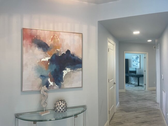 Foto del edificio - Coastal Luxury at Hidden Bay | 3BR Waterfront Condo with Bay Views