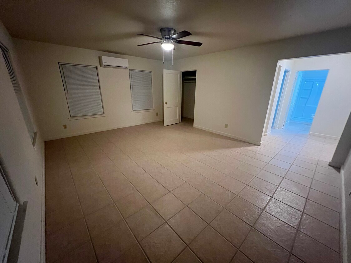 Main living area - 16’x12’ with storage closet, ceiling fan and mini-split - 217 N 1st St