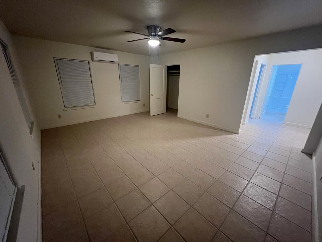 Main living area - 16’x12’ with storage closet, ceiling fan and mini-split - 217 N 1st St