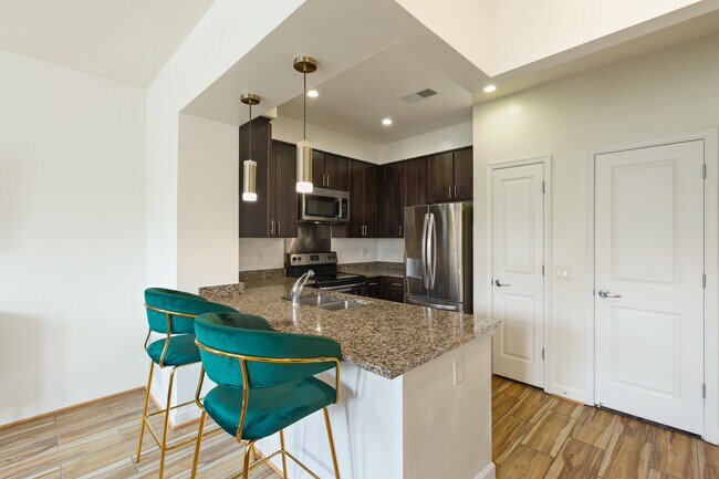 Lux modern kitchen with island/peninsula for entertaining friends and guests - 2536 Sheridan Rd SE