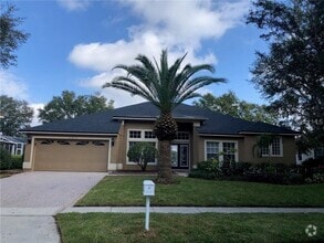 Building Photo - 10373 Emerald Woods Ave