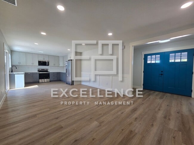 Building Photo - All Newly Remodeled Throughout Home With Huge Yard