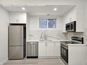 Building Photo - 6123-6133 33 Ave NW