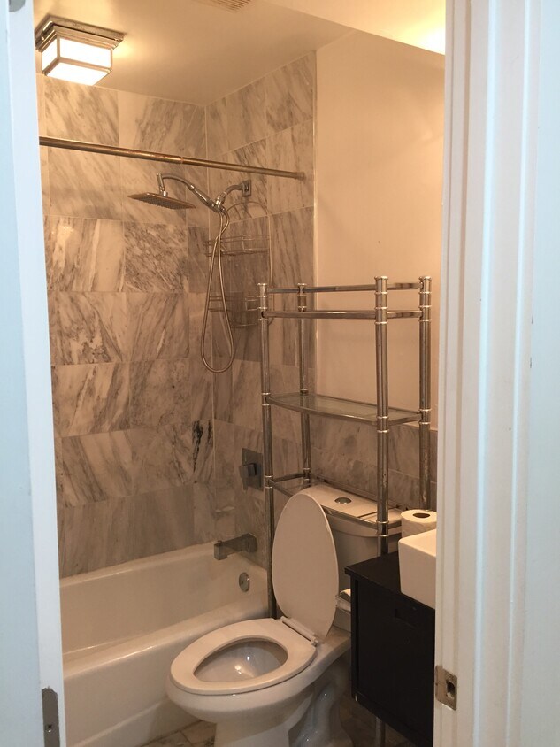bathroom. over toilet storage included - 1626 Massachusetts Ave SE