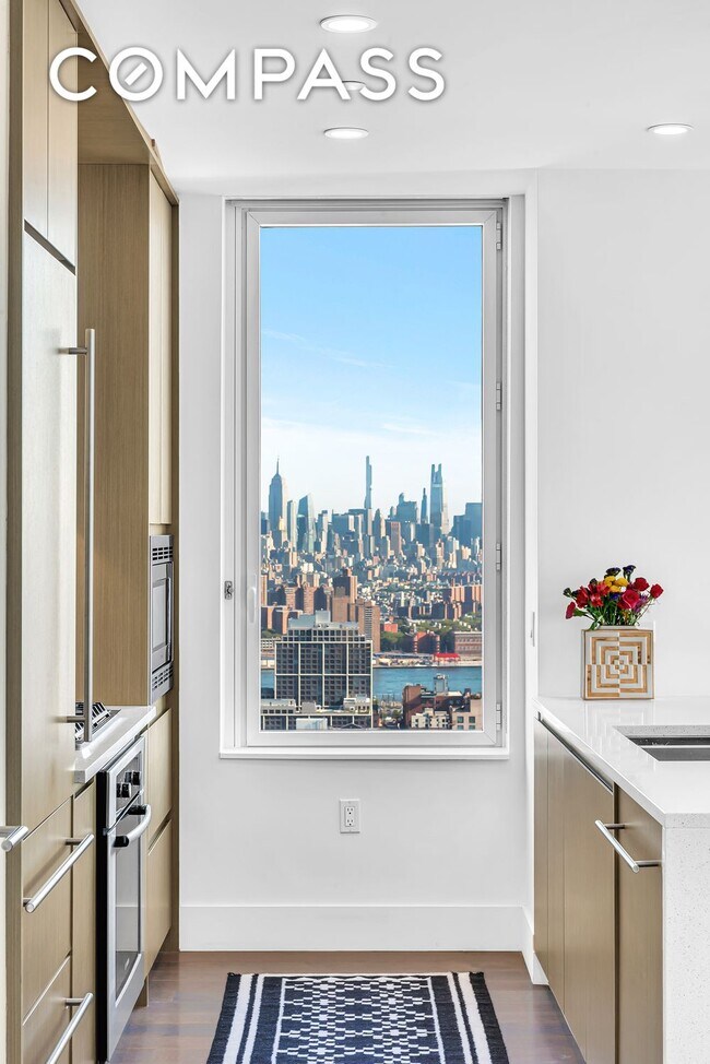 Foto del edificio - Elegant Condo Living with Impressive Views and Exclusive Building Amenities in the Heart of Downt...