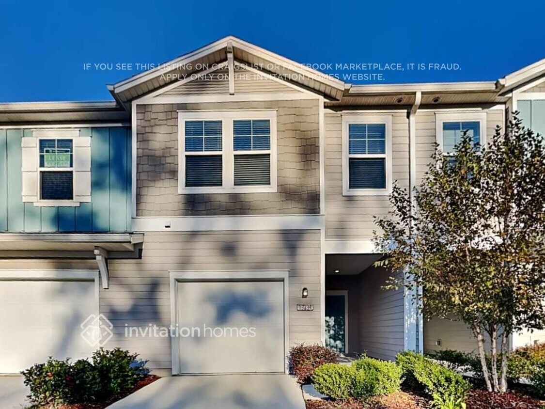 Foto principal - 13234 Shore Grass Dr