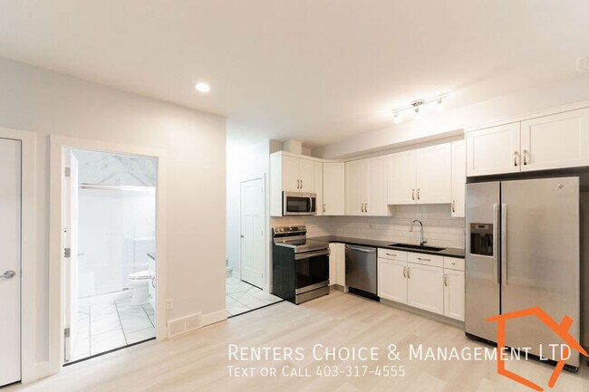 Photo du bâtiment - NEW PRICE! 2 Bedroom Basement Suite Utilities Included