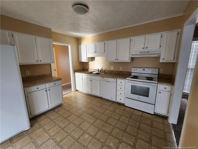 Building Photo - 6832 Woodmark Dr