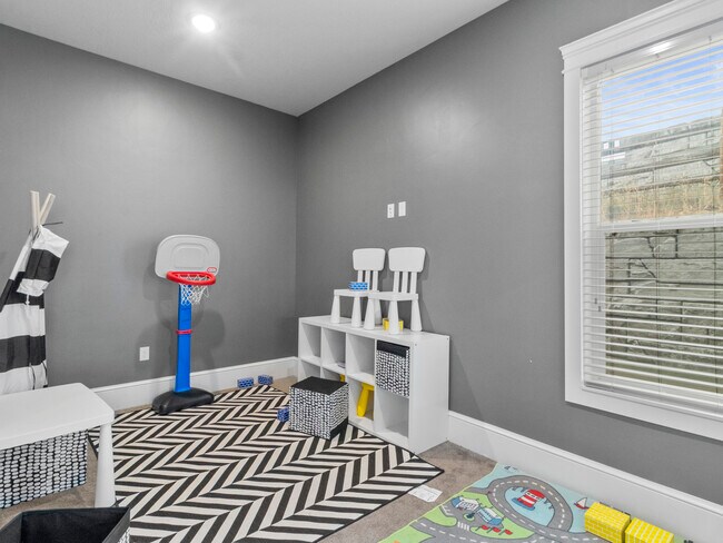 Sala de juegos dentro del área del gimnasio - South Ridge Townhomes and Apartments