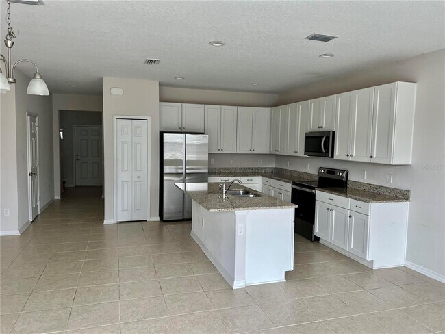 Foto del edificio - 6407 Tillandsia Pl