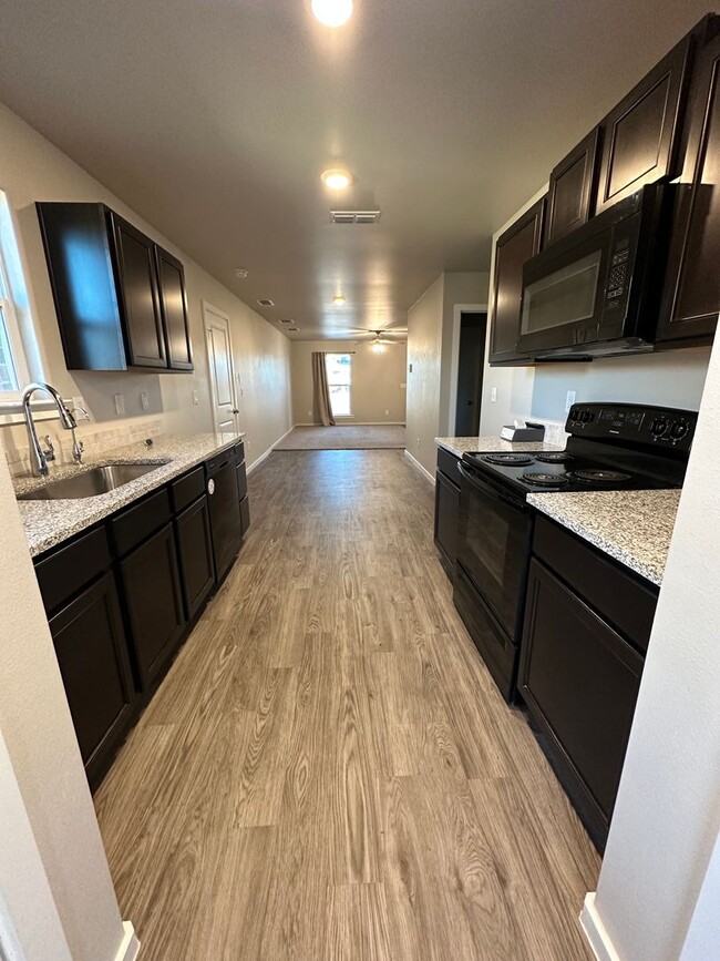 Building Photo - 1611 134th Street - Move in Special 1/2 of...