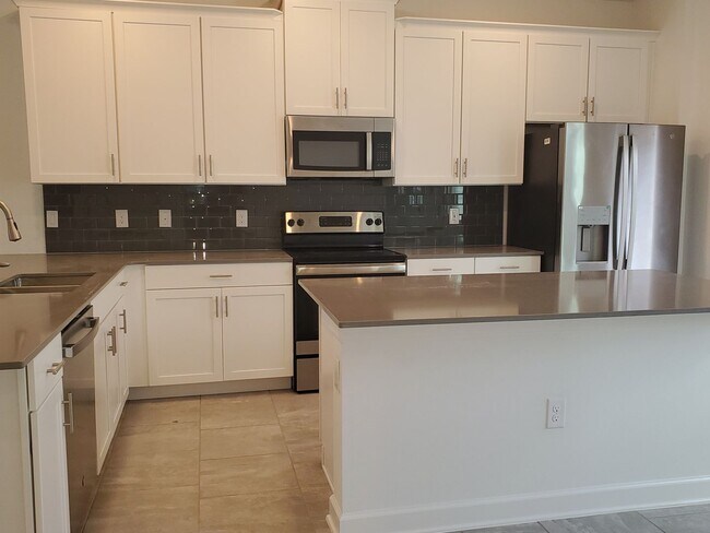 Building Photo - Spacious Bridgewalk Townhome