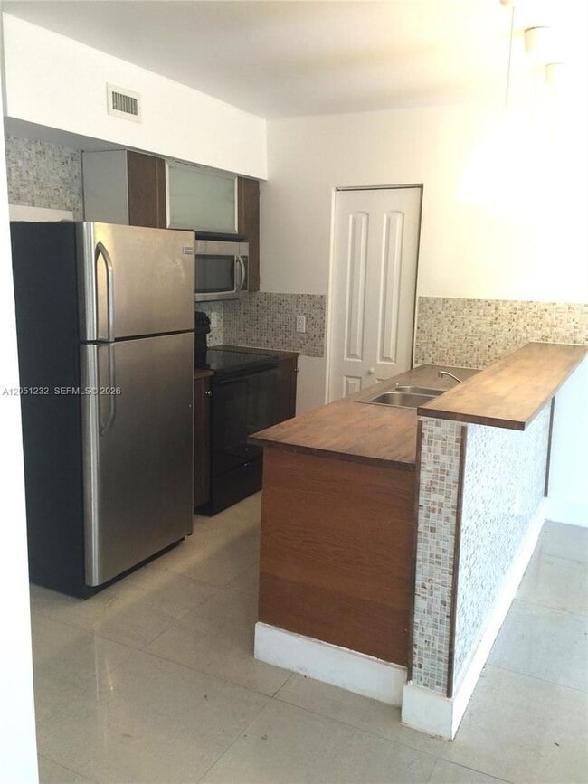 Photo - 7025 Rue Granville 1 1, Miami Beach, FL 33141 House