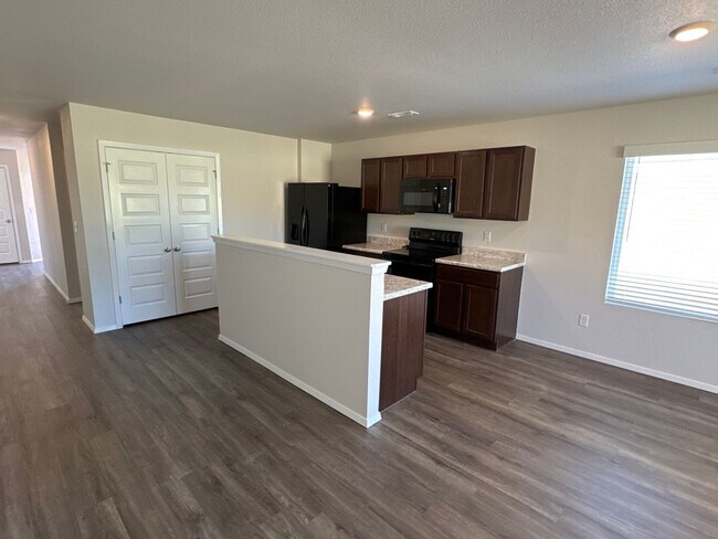 Building Photo - *Pre-leasing* NEWER Four Bedroom | Two Bat...