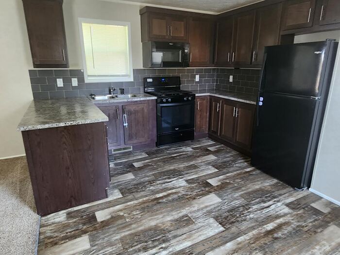 Primary Photo - 2 Bedroom/1 Bathroom Mobile Home