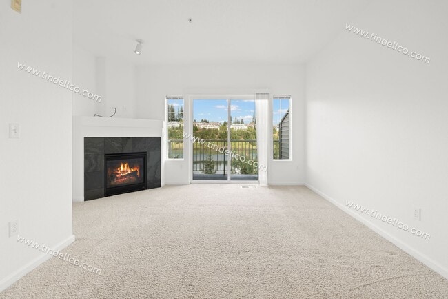 Building Photo - 2ND MONTH FREE! Charming Townhome w/ Fireplace, Balcony & More Near Progress Ridge!
