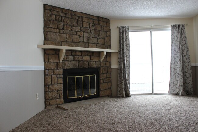 Family room with porch, fireplace - 14152 E Colorado Dr