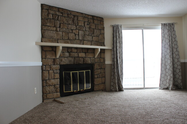 Family room with porch, fireplace - 14152 E Colorado Dr