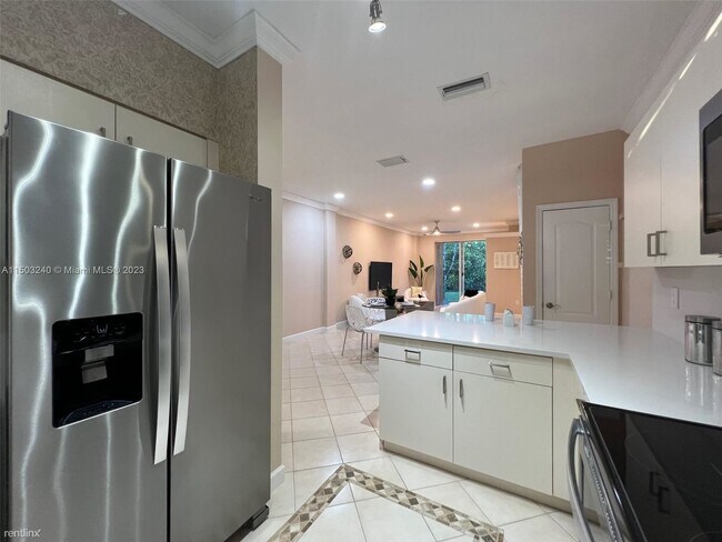 Building Photo - 2 br, 2.5 bath Townhome - 5790 NW 48th Ave