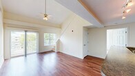 Located at 870 Plantation Rd in Blacksburg, Virginia, this two-story, 3-bedroom, 3-bathroom home offers a well-designed layout spread across two floors. The main level forms the heart of the home, featuring an open-concept living room, dining area, and kitchen. The living room stands out with soaring vaulted ceilings, a ceiling fan, and rich hardwood flooring that flows throughout, while a staircase leads to the upper level. Large windows invite natural light and offer views of the surrounding greenery. The kitchen is well-appointed with warm wood cabinetry, granite-style countertops, black appliances including a range and built-in microwave, and a peninsula that provides additional workspace and seating. A pantry adds practical storage nearby. The three bedrooms are comfortable and well-lit, each featuring ceiling fans and carpeted floors. The primary bedroom provides a private retreat, while additional bedrooms offer flexibility for guests or a home office. The three bathrooms are clean and functional, featuring wood-toned vanities, white countertops, and tiled tub-shower combinations. A dedicated laundry room with a full-size washer and dryer adds everyday convenience. Completing the home is a private patio, perfect for outdoor relaxation. Ample closet space is found throughout the residence.