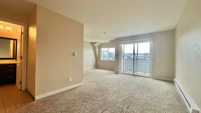 Building Photo - Top Floor Sweet and Spacious studio with resort style amenities and In-Unit Washer & Dryer!
